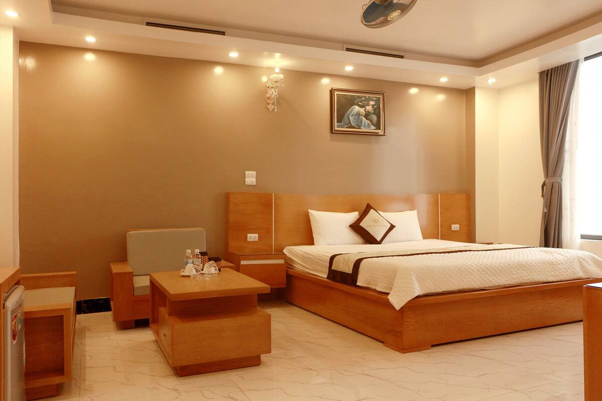 Deluxe Double Room, Beach View | Minibar, desk, free WiFi