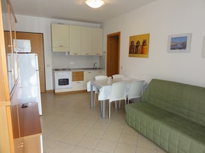 Apartment, 1 Bedroom (A20111) | Private kitchenette | Full-sized fridge, microwave, stovetop, cookware/dishes/utensils