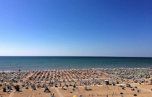 On the beach, white sand