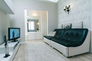 Business appartement, 1 slaapkamer, patio | Luxe beddengoed, donzen dekbedden, een strijkplank/strijkijzer