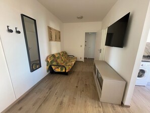 Apartment, 2 Bedrooms (A90095) | Living area | 19-inch flat-screen TV with digital channels, TV