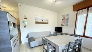 Apartment, 3 Bedrooms (A N. 4) | Living area - Villa Capri (San Michele al Tagliamento)