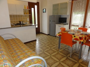 Apartment, 1 Bedroom (B30012) | Living area | 19-inch flat-screen TV with satellite channels, TV