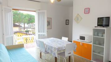 Apartment, 1 Bedroom (Via Lira 62 C40081) | Living area | 19-inch flat-screen TV with satellite channels, TV