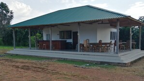 A single-story house with a covered patio area.