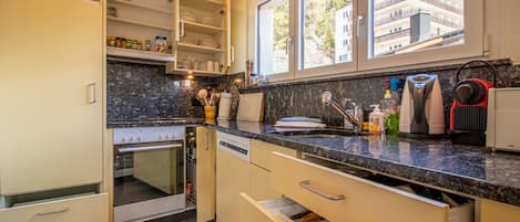 Apartment | Private kitchen | Fridge, oven, stovetop, dishwasher