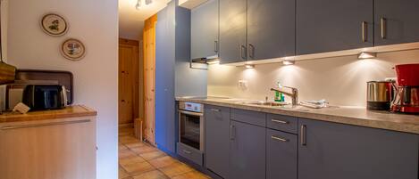Apartment | Private kitchen | Fridge, oven, stovetop, dishwasher
