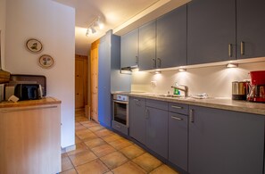 Apartment | Private kitchen | Fridge, oven, stovetop, dishwasher