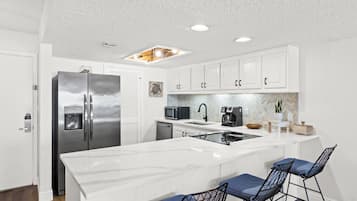 Condo | Private kitchen | Full-size fridge, microwave, oven, stovetop