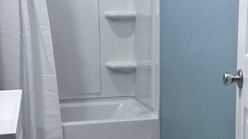 Shower, towels, soap, shampoo