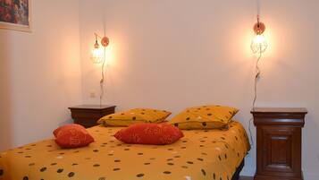 1 bedroom, desk, iron/ironing board, travel crib