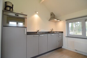 House | Private kitchen | Highchair - Inviting Holiday Home in Stramproy With Terrace (Stramproy)