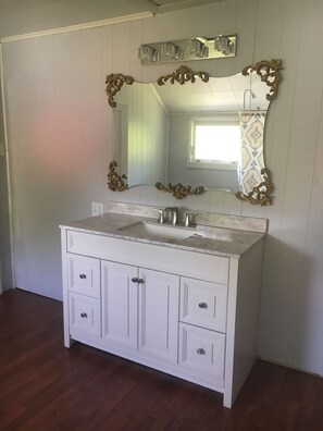 Combined shower/bathtub, hair dryer, towels, soap