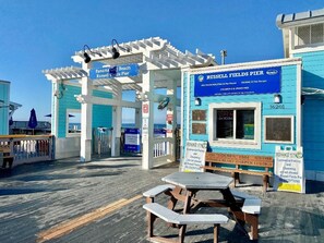 Stroll along the pier and enjoy the scenic views from Russell Fields Pier, a popular spot for fishing and walking.