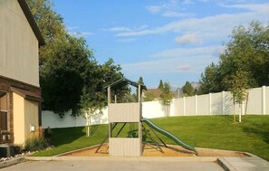 Playground and swing next to our townhouse