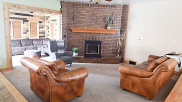 Flat-screen TV, fireplace, streaming services, stereo