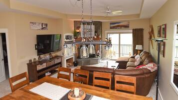 Télévision, cheminée, table de tennis de table