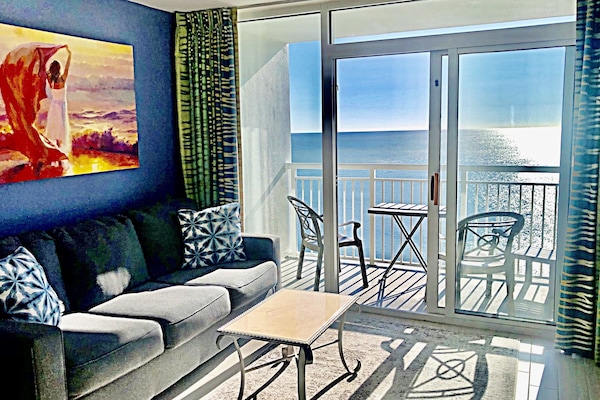 Bright living room with balcony