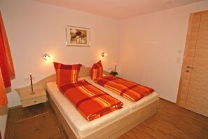 Apartment, 2 Bedrooms, Non Smoking, Mountainside | 2 bedrooms, in-room safe, desk, travel crib - Alpina Appartements (Schroecken)