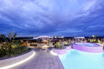 Outdoor pool, pool umbrellas, sun loungers