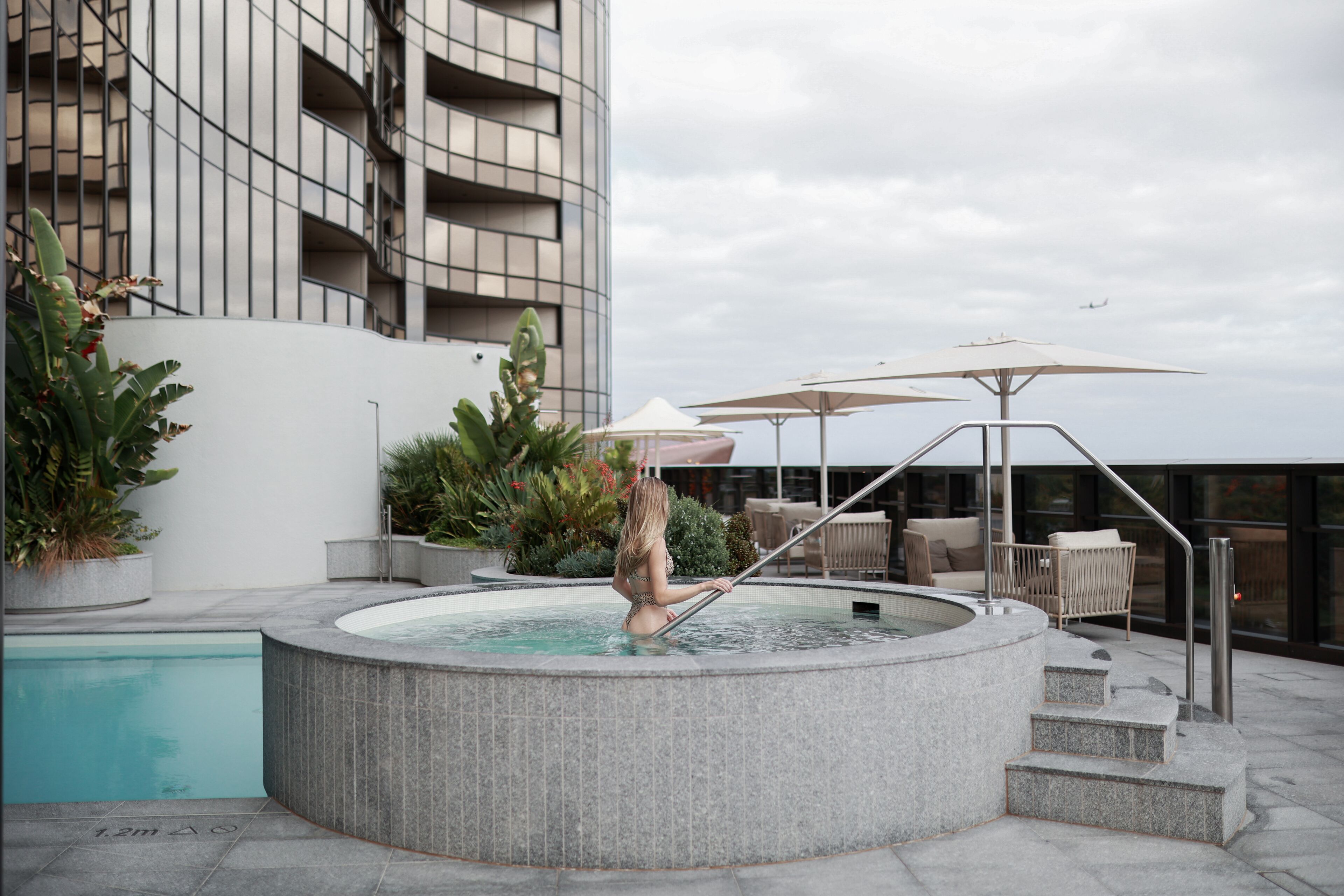 outdoor pool, pool umbrellas, pool loungers