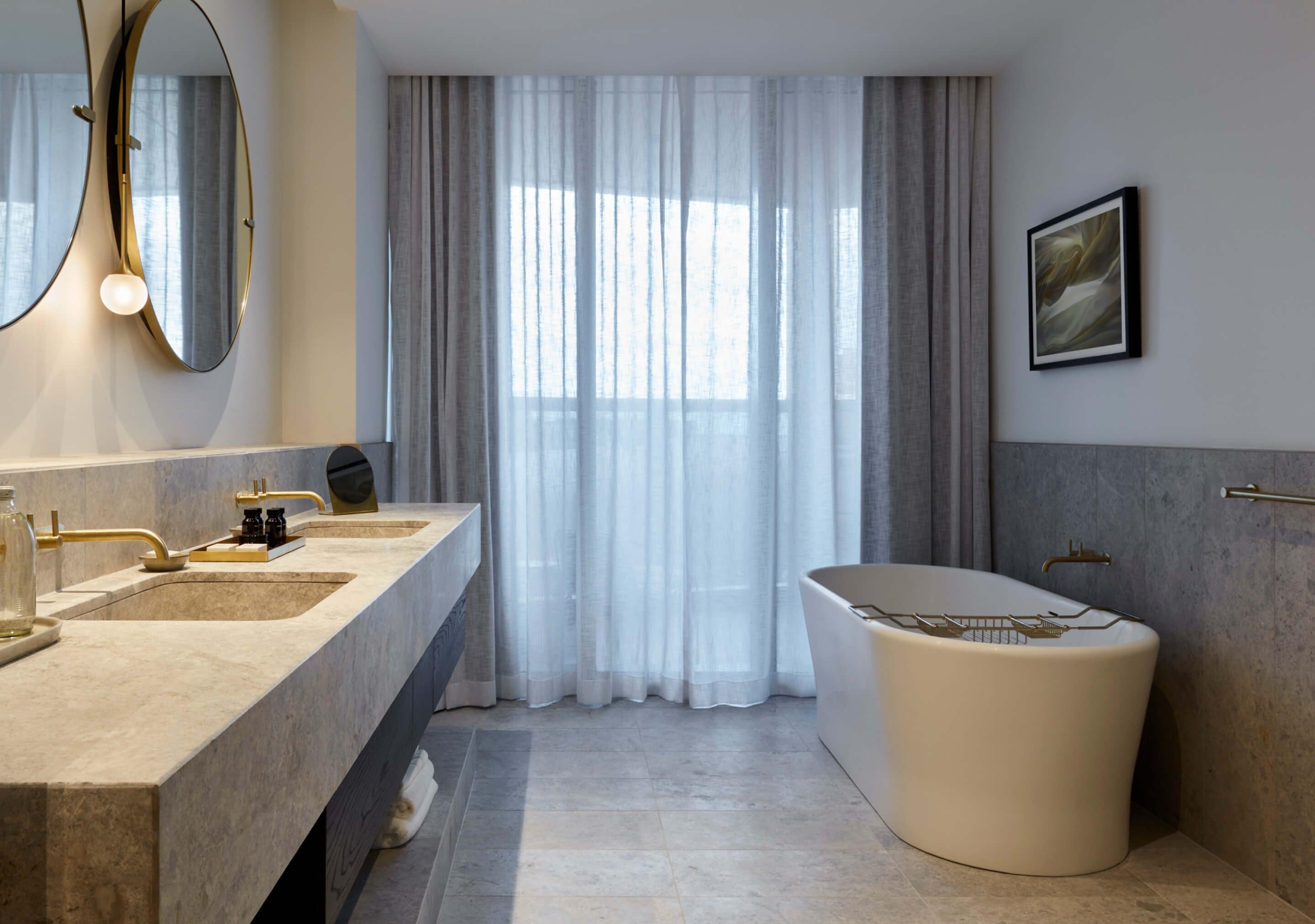 designer toiletries, hair dryer, bathrobes, slippers