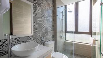 Shower, rainfall showerhead, designer toiletries, hair dryer