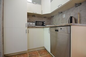 Appartement | Cuisine privée | Réfrigérateur, four, plaque de cuisson, lave-vaisselle