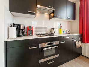 Apartment | Eigene Küche | Wasserkocher mit Kaffee-/Teezubehör, Kühlschrank, Mikrowelle, Hochstuhl
