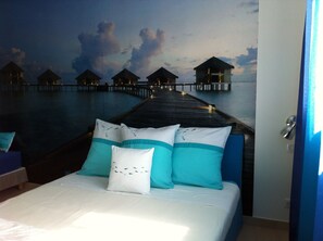 3 chambres, coffres-forts dans les chambres, fer et planche à repasser