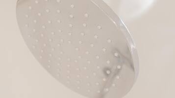 A showerhead with multiple round holes.