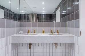 Bathtub, eco-friendly toiletries, hair dryer, bidet
