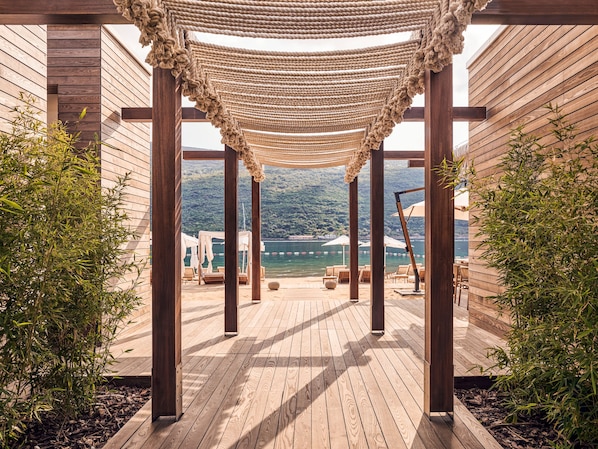 On the beach, beach shuttle, beach cabanas, sun loungers