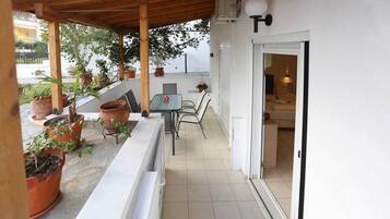 Stúdíóíbúð - útsýni yfir garð - jarðhæð | Verönd/útipallur