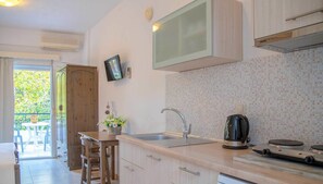 Double Studio Apartment | Private kitchenette | Mini-fridge, stovetop, electric kettle, cookware/dishes/utensils - Anastasia Studios (Kassandra)