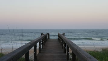 On the beach, sun loungers, beach towels