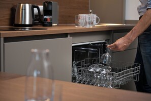 Amazing Apartment mit Terrasse | Private kitchen | Full-size fridge, microwave, stovetop, dishwasher