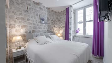 Apartemen (One bedroom Apartment) | 1 kamar tidur dan tempat tidur bayi