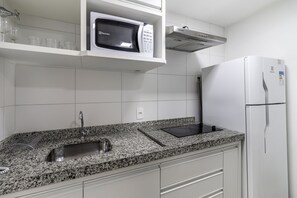 Fridge, microwave, coffee/tea maker, toaster