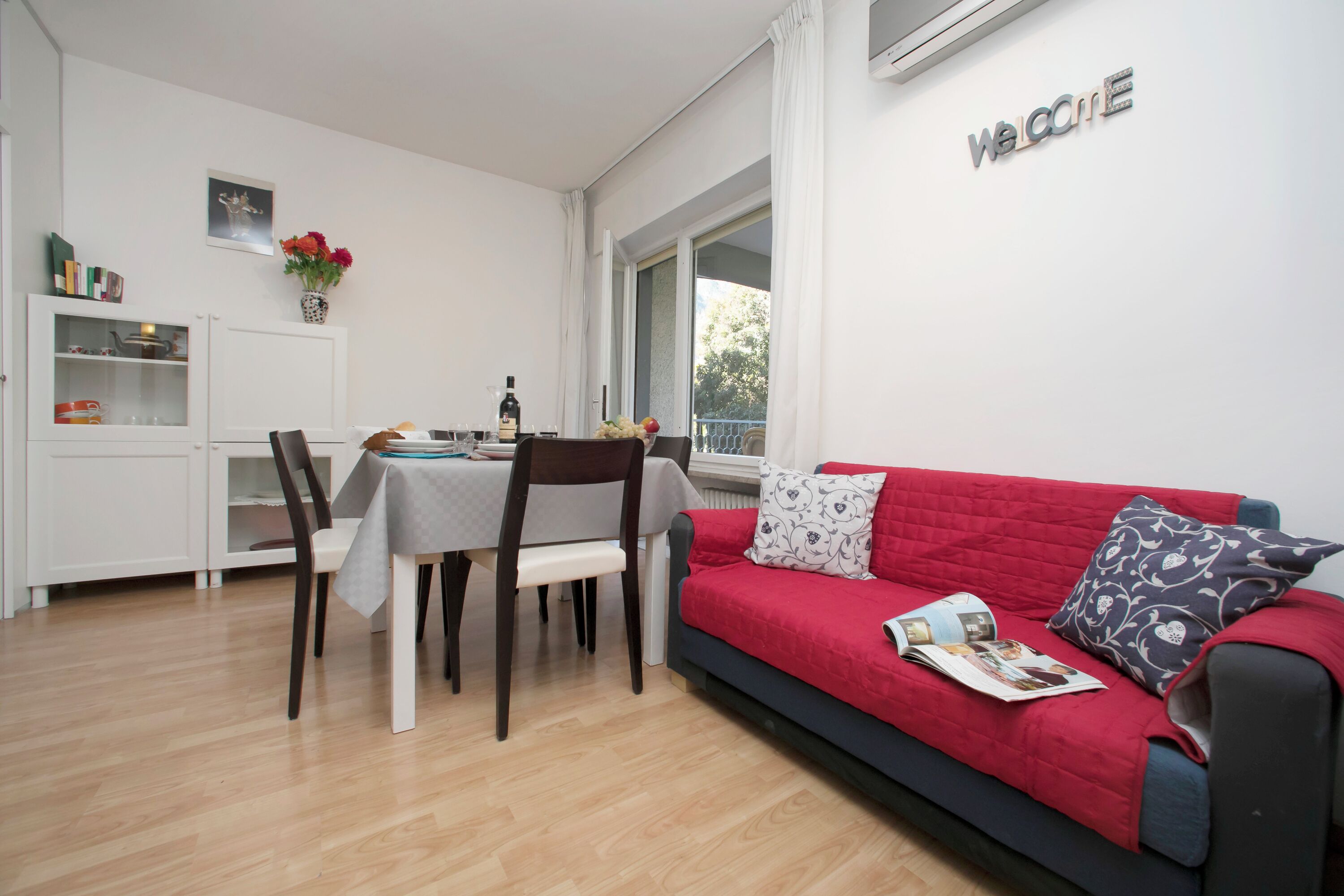 Family Apartment, Multiple Bedrooms, Lakeside (Riva Lago e Spiaggia Apartment) | Living area | Flat-screen TV