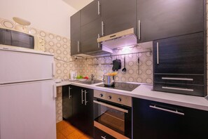 Family Apartment, Multiple Bedrooms (Casa Franco e Ilva 1) | Private kitchen | Fridge, microwave, stovetop, electric kettle - Casa Franco e Ilva 2 (Arco)