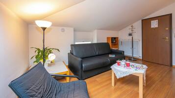 Family Apartment, 1 Bedroom (Casa Franco e Ilva 2) | Living area | Flat-screen TV