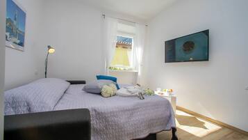 Estudio familiar (Nido sui Tetti di Riva del Garda) | Tabla de planchar con plancha, wifi gratis, ropa de cama