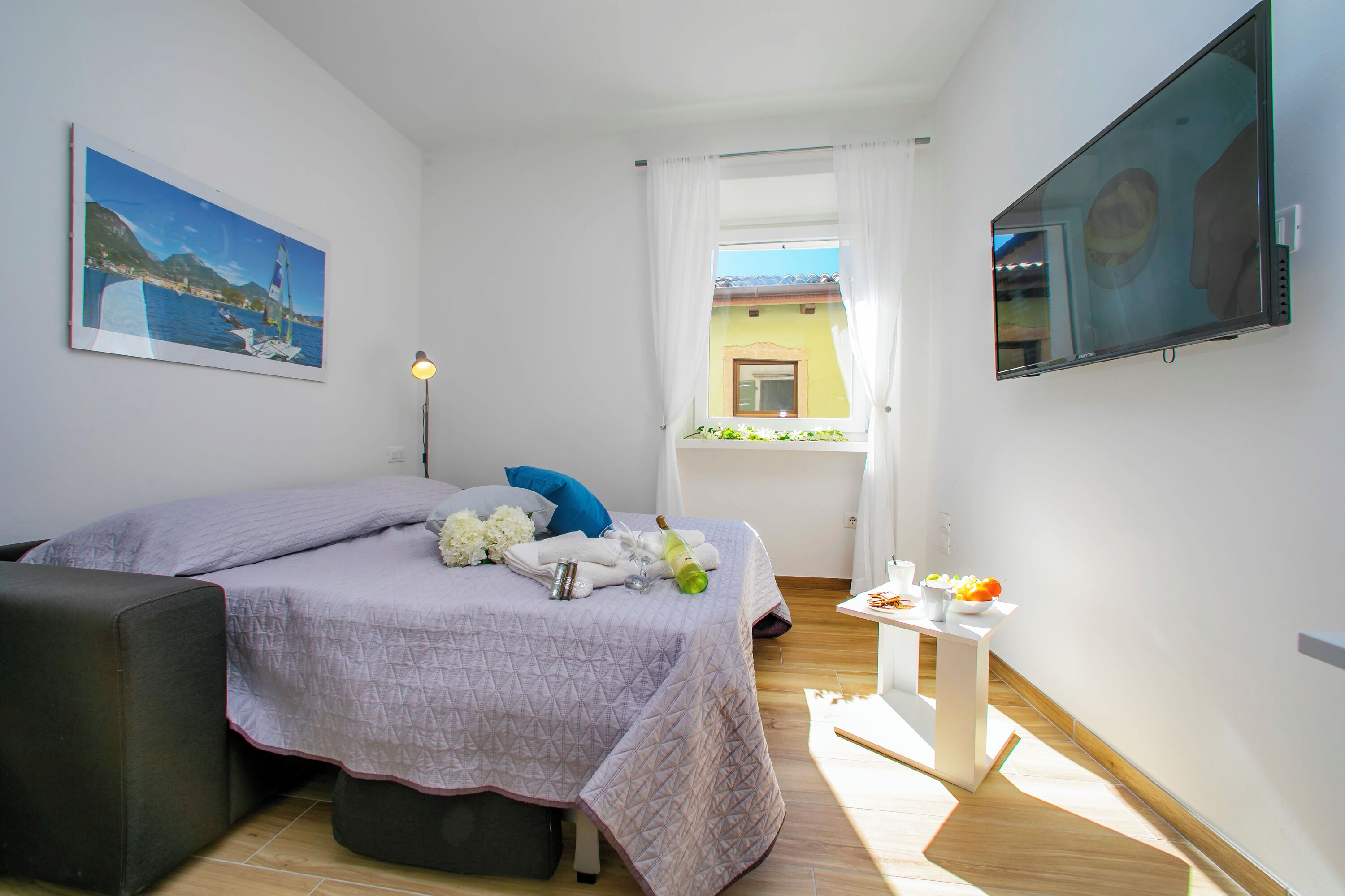 Estúdio família (Nido sui Tetti di Riva del Garda) | Ferros/tábuas de passar roupa, Wi-Fi de cortesia, roupa de cama