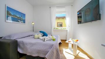 Estúdio família (Nido sui Tetti di Riva del Garda) | Ferros/tábuas de passar roupa, Wi-Fi de cortesia, roupa de cama