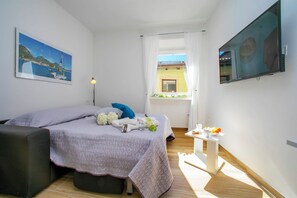 Familienstudio (Nido sui Tetti di Riva del Garda) | Bügeleisen/Bügelbrett, kostenloses WLAN, Bettwäsche