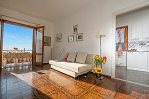 Family Apartment, Multiple Bedrooms, Mountainside (Balcone Panoramico sul Garda) | Living area - Balcone Panoramico sul Garda (Tremosine)