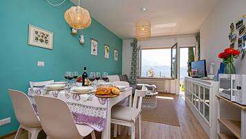 Apartamento família, vários quartos, ao lado da montanha (Casa Turchese) | Sala de jantar