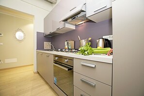 Family Apartment, Multiple Bedrooms (Residenza Il Cavaliere del Lago) | Private kitchen