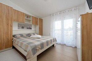 2 quartos, Wi-Fi de cortesia, roupa de cama
